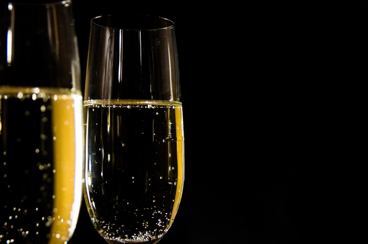 bubbly champagne in glass flutes